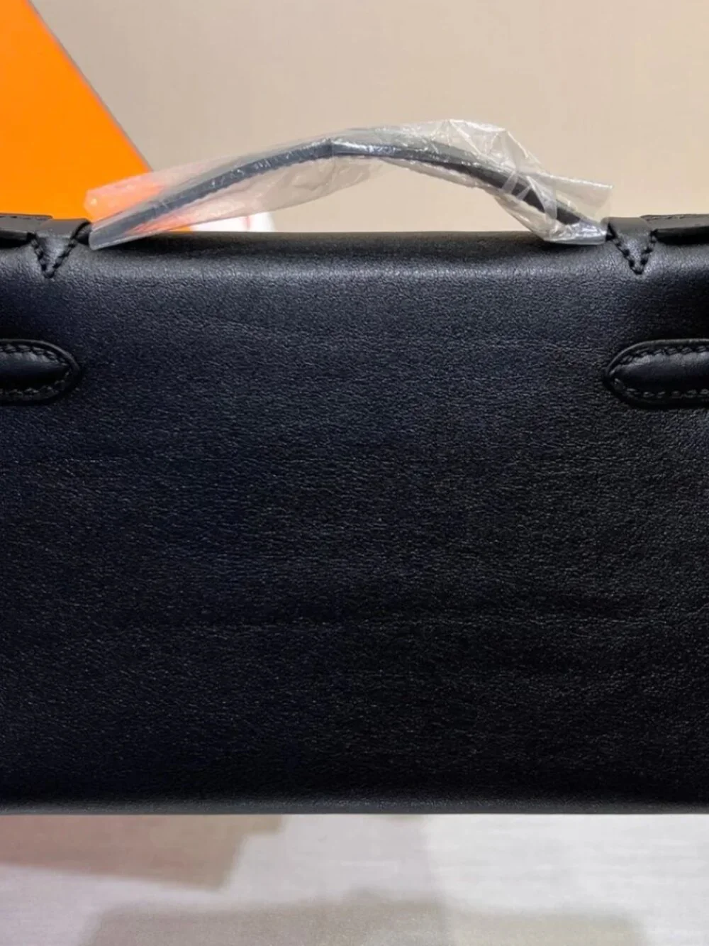 H Kelly pochette- swift, shw
